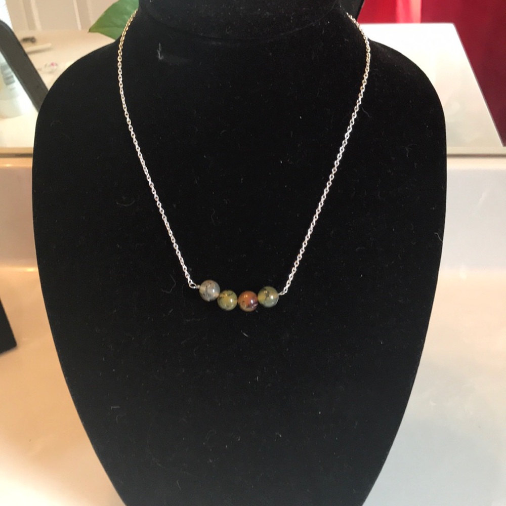 Beautiful beaded necklace with silver chain